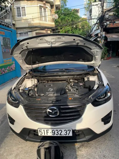 lắp bình ắc quy varta q85 cho xe mazda